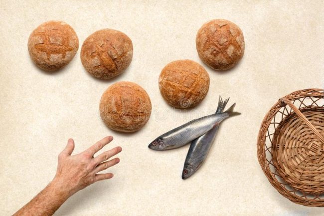 hand-stretched-out-five-barks-two-fish-removed-wicker-basket-139205239